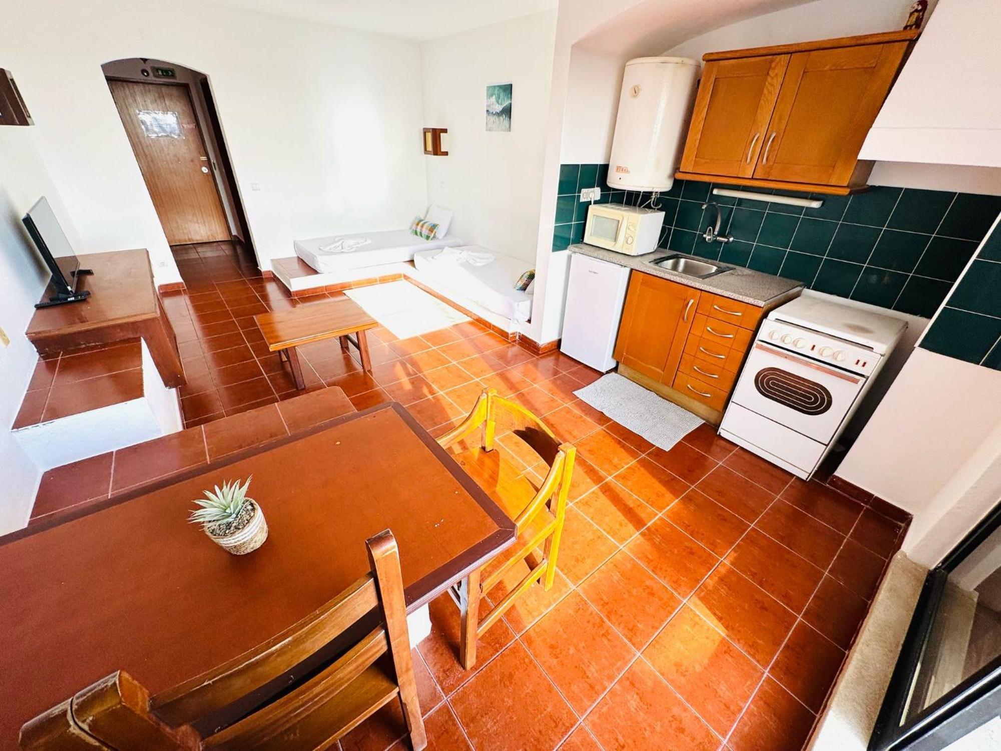 Oura Apartment *